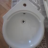 Lavandino angolare, diametro vasca 50 cm.