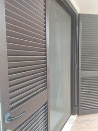 Porta in PVC con relativa porta esterna