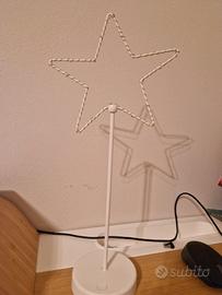 Lampada da lettura a forma di stella