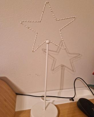 Lampada da lettura a forma di stella