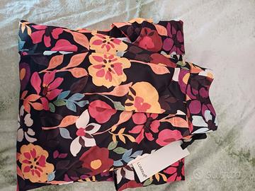 vestiti nuovi ancora con cartellini