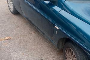 Auto Lancia y elefantino blu