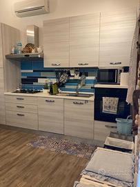 Camera matrimoniale, cameretta, cucina e bagno