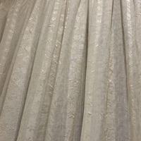 Tenda beige in viscosa lavorata