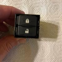 Interruttore apri e chiudi portiere passeggero .