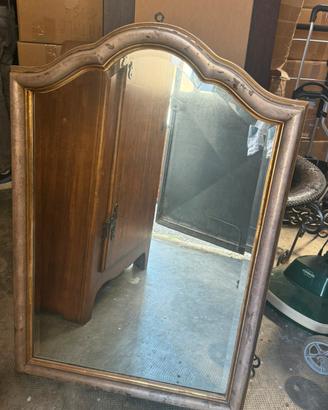 Specchiera in legno dorato con vetro bisellato