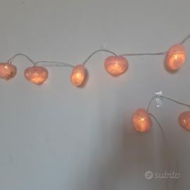 Luci rosa a forma di cuore
