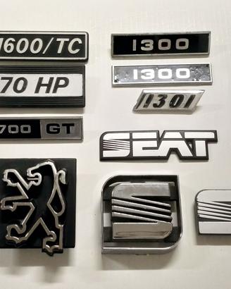 FIAT/SEAT/Peugeot - 10 Fregi/Emblemi