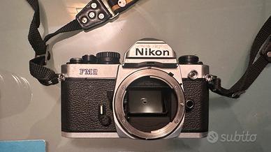 Nikon Fm2 con obiettivo&flash