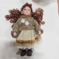 Bambola vintage  in porcellana da collezione