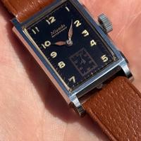 Orologio tank Nivada Clamshell gilt