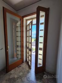 Porta d'ingresso in legno