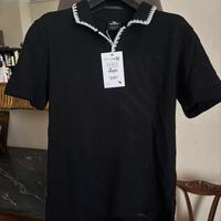 Polo pull and Bear nera con cuciture bianche