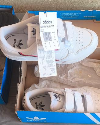 scarpe Adidas e scarpini joma