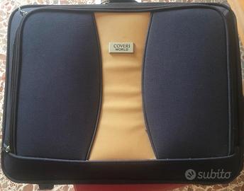 Valigia COVERI W. manico telescopico da riparare