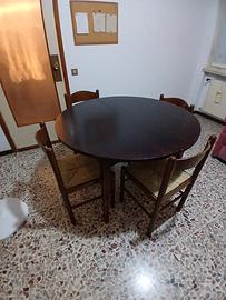 tavolo tondo allungabile con sedie 