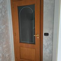 porta battente e tre scorrevoli