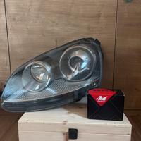 Faro destro golf gti 5 ( lato guida )