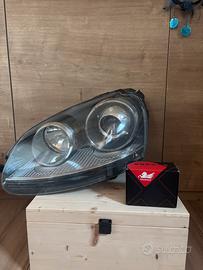 Faro destro golf gti 5 ( lato guida )