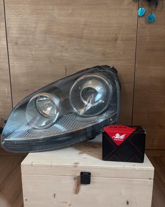 Faro destro golf gti 5 ( lato guida )