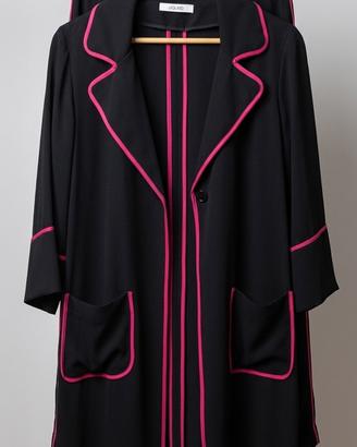 * Tailleur lungo con pantaloni