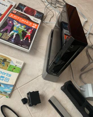 Wii con giochi e manubrio