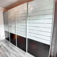 armadio 4 ante scorrevoli in vetro e legno