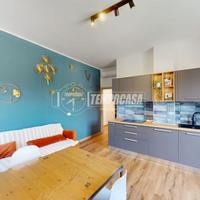 TRILOCALE IN CENTRO CON VISTA APERTA E BOX AUTO