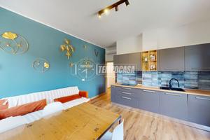 TRILOCALE IN CENTRO CON VISTA APERTA E BOX AUTO