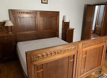 Camera da letto in legno intarsiato