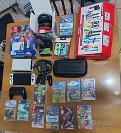 nintendo switch oled con giochibe accessori
