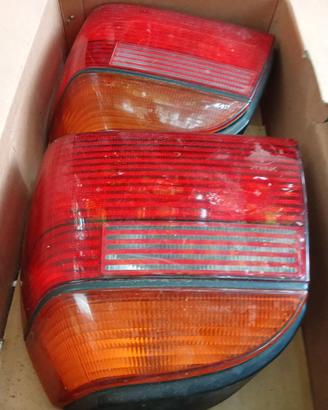  fanali post.nuovi in scatola x golf tre....