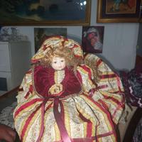 Bambola vintage di porcellana grande con abito sto