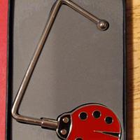 gancio da tavolo per borsetta