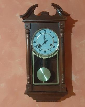 Orologio a pendolo meccanico da parete in legno