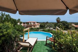 Villa con piscina privata e vista mare - is molas