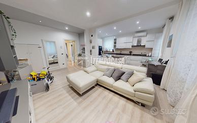 CADORAGO: quadrilocale con area esterna, box e dep