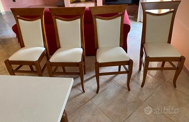 Quattro sedie Scavolini in legno di noce