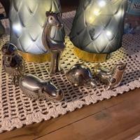 Statuine in foglie d’argento brumal