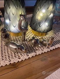 Statuine in foglie d’argento brumal