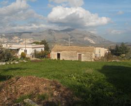 Casa con terreno e rudere