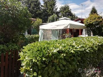 Casetta in legnocon roulotte campeggio oulx