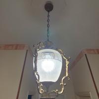 Antico lampadario in bronzo