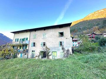 ANGHEBENI: ampia porzione di casa con terreno !