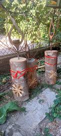porta candele su tronchetti di legno