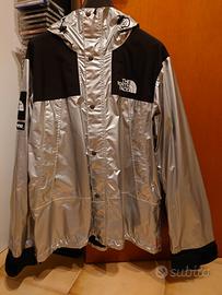 the North face x supreme silver jacket parka