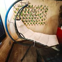 Poltrona a dondolo sospesa da esterno con cuscino