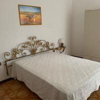 Camera centrale con bagno e cucina