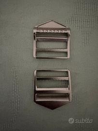 Fibbie metalliche spray hood