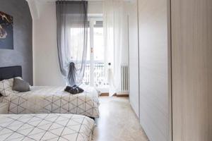 Stanza condivisa con balcone